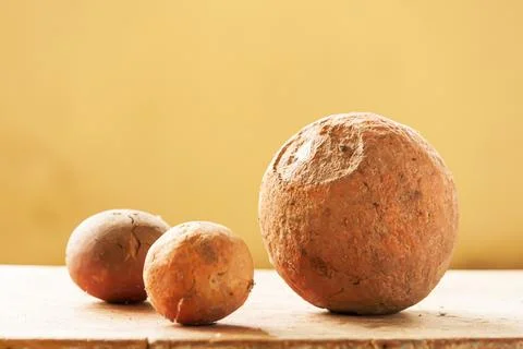 Ancient mud balls display at the local museum. Stock Photos