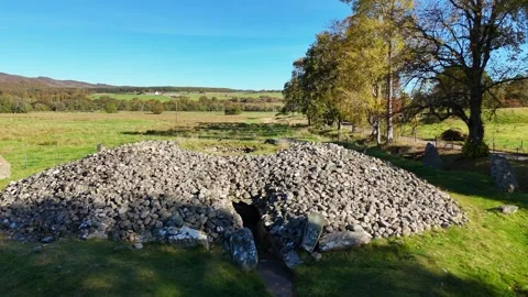 Ancient Neolithic Passage Grave and Standing Stones Scotland Stock Footage 330661556