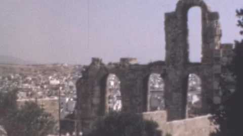 Ancient Odeon of Herodes Atticus and Athens Cityscape Pan 1960s Video stock 337017318