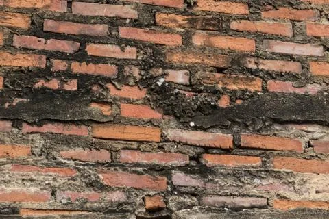 Ancient old brick wall red grunge surface with weathered cement texture backg Stock Photos