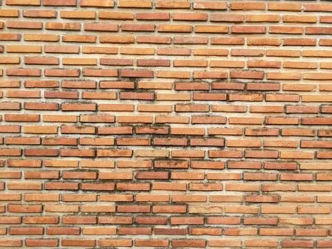 Ancient old brick wall red grunge surface with weathered cement texture backg Stock Photos