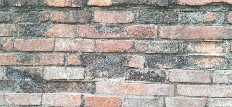 Ancient orange brick wall texture background for design and decoration Stock Photos