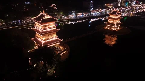 Ancient pagodas in hoa lu at night reflecting on the river, ninh binh, viet.. Stock Footage 335084698