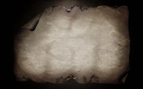 Ancient paper on the dark background Stock Photos