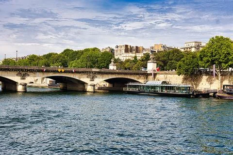 Ancient Pont Alexandre III deck arch bridge spanning the Seine in Paris Stock Photos