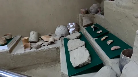 Ancient pottery and clay artifacts at Afrasiab Museum in Samarkand Stock Footage 336679217