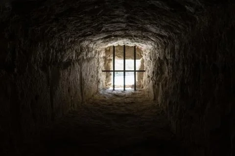 Ancient prison window Stock Photos
