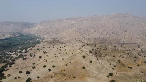 Ancient Ranikot Fort reveals massive walls across a rugged mountain landscape 스톡 동영상 345717251
