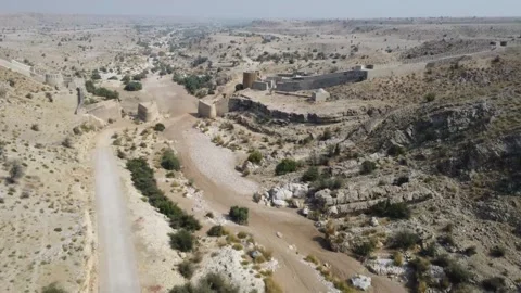 Ancient Ranikot Fort reveals massive walls across a rugged mountain landscape 스톡 동영상 345717410