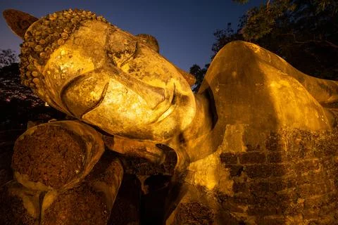 An ancient reclining Buddha. Stock Photos