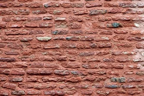 Ancient red brick wall of old house exterior, red brick texture on brickwor.. Stock Photos