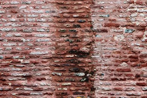 Ancient red brick wall of old house exterior, red brick texture on brickwor.. Stock Photos