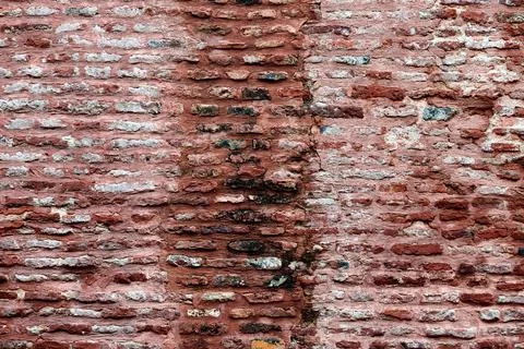 Ancient red brick wall of old house exterior, red brick texture on brickwor.. Stock Photos