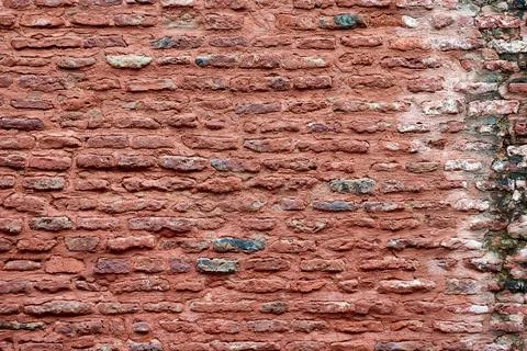 Ancient red brick wall of old house exterior, red brick texture on brickwor.. Stock Photos