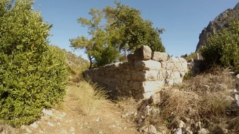 Ancient remains of walls under the evening sun Stock Footage 81745060