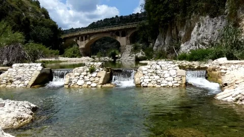 Ancient river dam and bridge Stock Footage 263300852