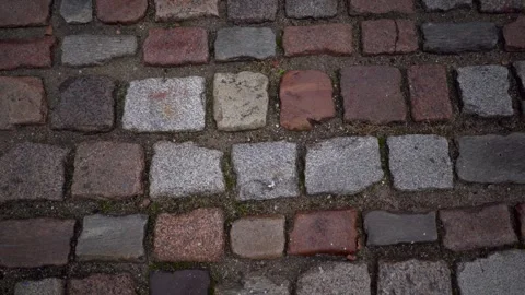 An ancient road lined with red and gray stone. Stock Footage 256156700