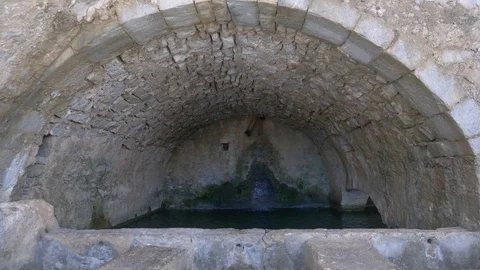 Ancient rock built water cistern seen in Northern Crete Stock Footage 112625561