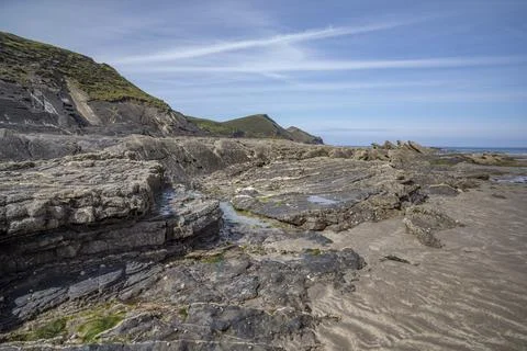 Ancient rock formations on the Crackington Haven beach Foto stock