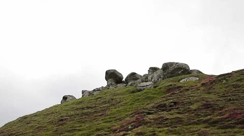 Ancient rocks formation on mountain peak, Vf. cu Dor Stock-Footage 44120568