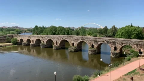 Ancient Roman bridge in Merida Spain on a clear blue day Stock Footage 107440852