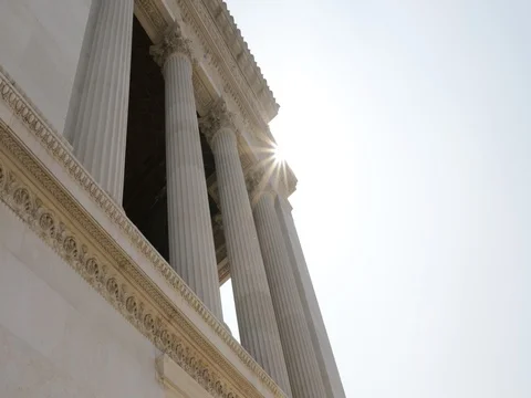 Ancient roman columns with backlit sun Stock Footage 74479685