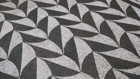 Ancient roman floor mosaic baths caracalla rome displays repeating geometric Stock Footage 324760244