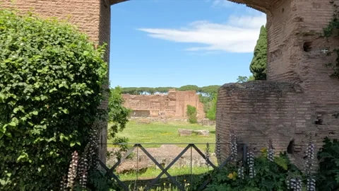 Ancient Roman Ruins View Through Historic Arch in Rome Italy Archaeological Site 스톡 동영상 332623666