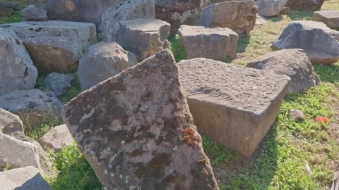 Ancient Roman Stone Blocks and Corinthian Capital Ruins in the Roman Forum,.. Stock Footage 338176100