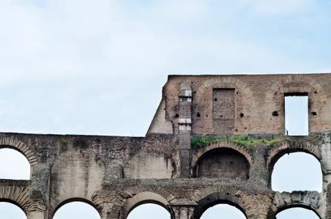 Ancient romans arch in colosseum, rome, italy Stock Photos