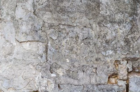 Ancient rough wall surface with shabby decorative plaster, rough textured bac Stock Photos