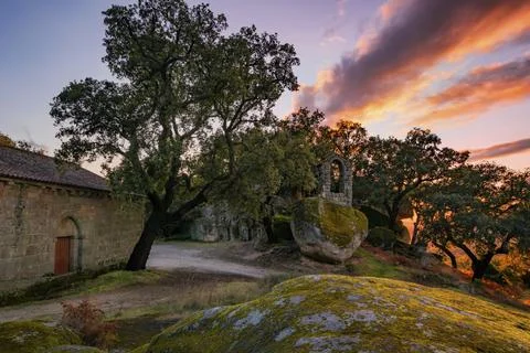 Ancient ruin stone structure building covered with moss near Sao Pedro chapel Fotos de archivo