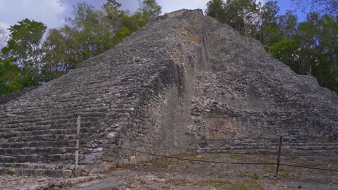 Ancient ruins of Mayan pyramids at the archaeological site of Coba on the Stock Footage 343886356