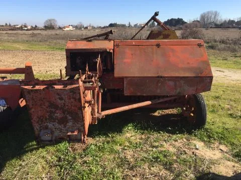Ancient rusty packer on a village Stock Photos