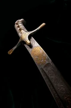 Ancient sabre on white Stock Photos