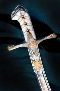 Ancient sabre on white Stock Photos