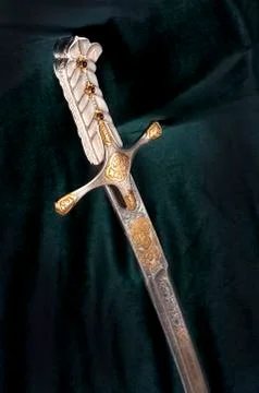 Ancient sabre on white Stock Photos