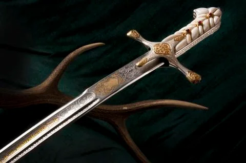 Ancient sabre on white Stock Photos