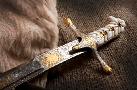 Ancient sabre on white Stock Photos