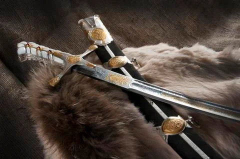 Ancient sabre on white Stock Photos
