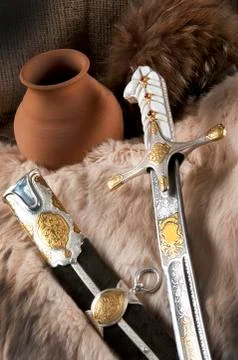Ancient sabre on white Stock Photos