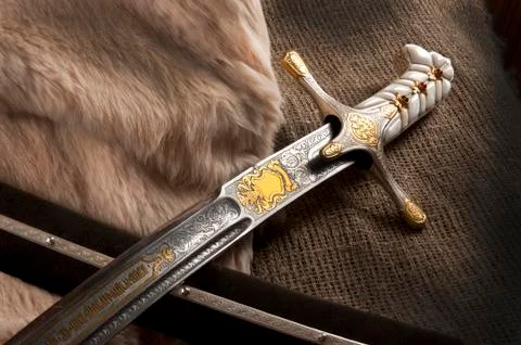 Ancient sabre on white Stock Photos