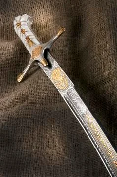 Ancient sabre on white Stock Photos