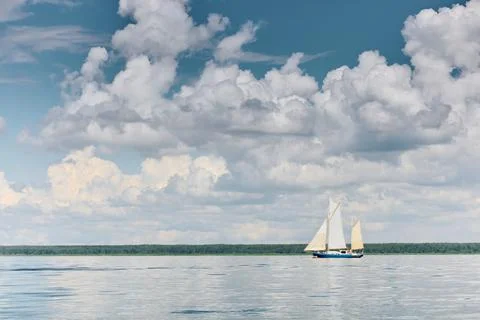 Ancient sail ship, magic reflections on water surface, sailing regatta in the Stock Photos