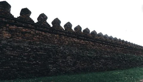 Ancient sandstone brick wall as the background. Stock Photos