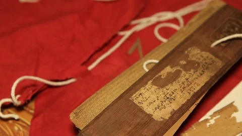 Ancient Sanskrit Writing on Palm Leaf Manuscript in India Stock Footage