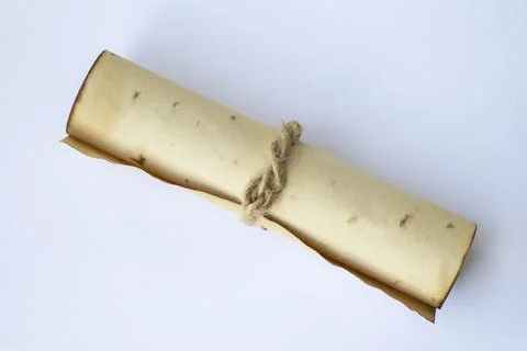Ancient scroll. Medieval manuscript on white background Stock Photos