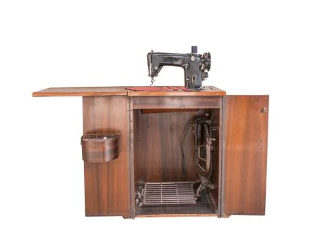 Ancient sewing machine, isolated on white background with clipping path Foto stock