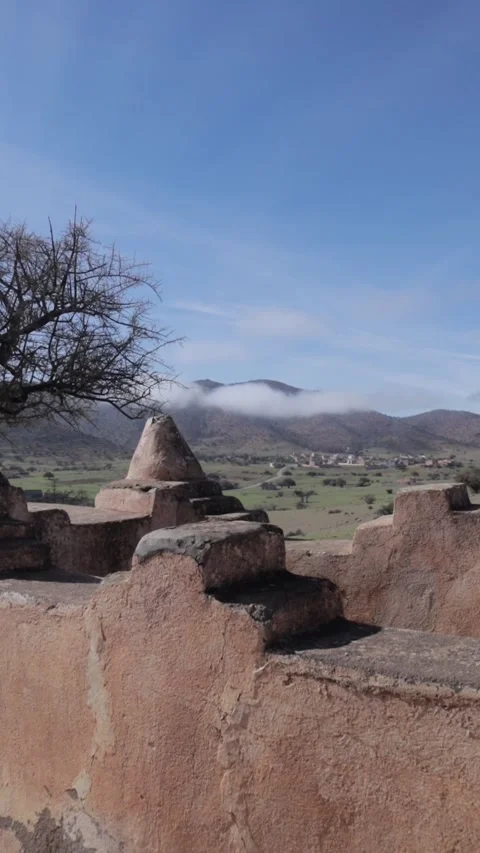 Ancient Shrine Overlooking Misty Valley, Ait Issafen, Morocco Stock Footage 332773249