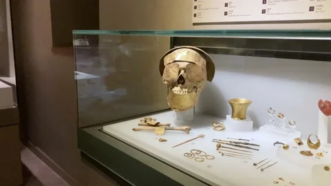 Ancient skull decorated with gold Stock Footage 237284422